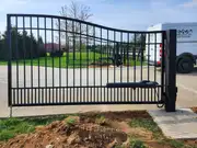 Large custom metal swing driveway gate in the Lexington, Kentucky area.