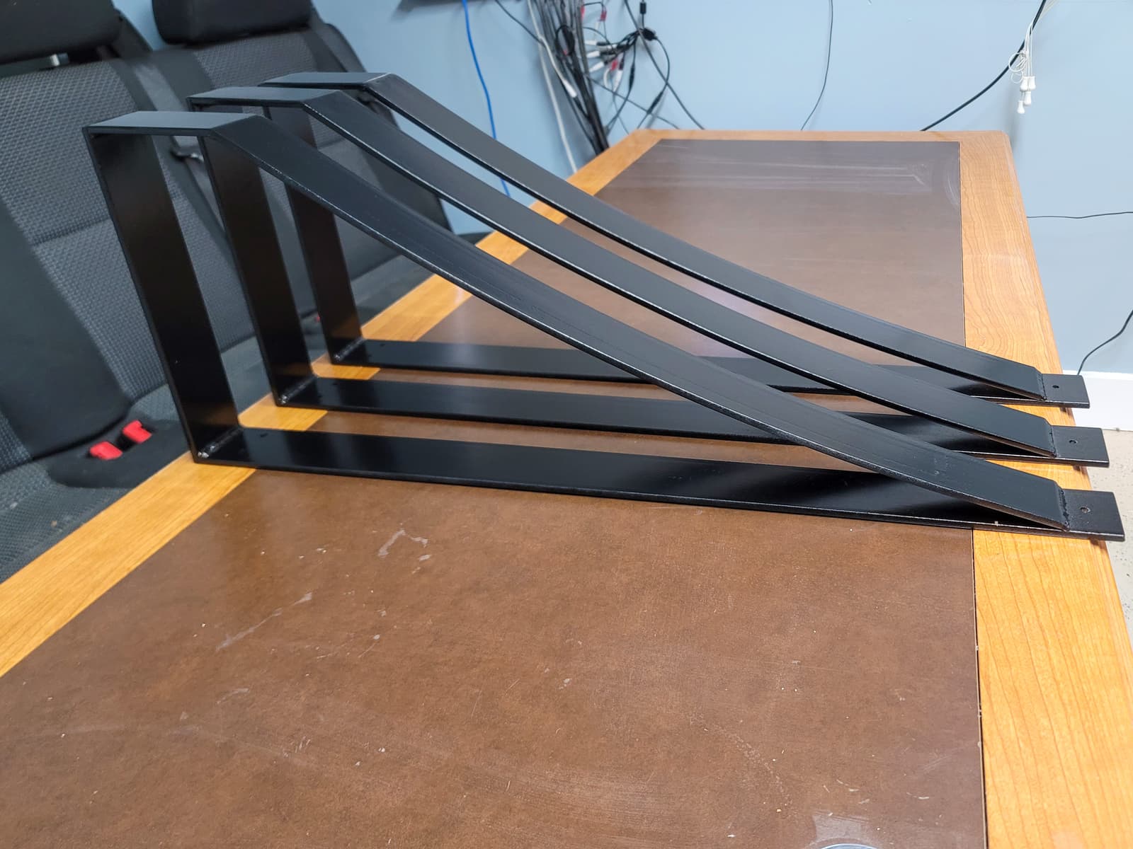 Metal fabrication work laid out on a shop table in Nicholasville, KY.
