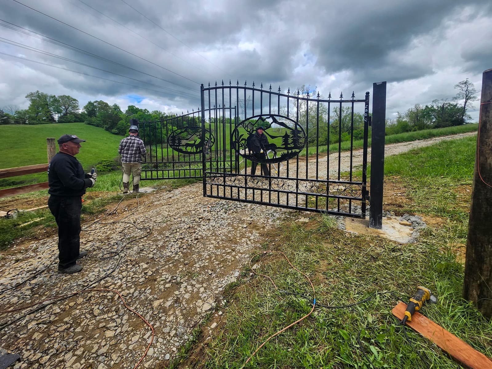 Custom metal gate project with decorative center panel and pickets.
