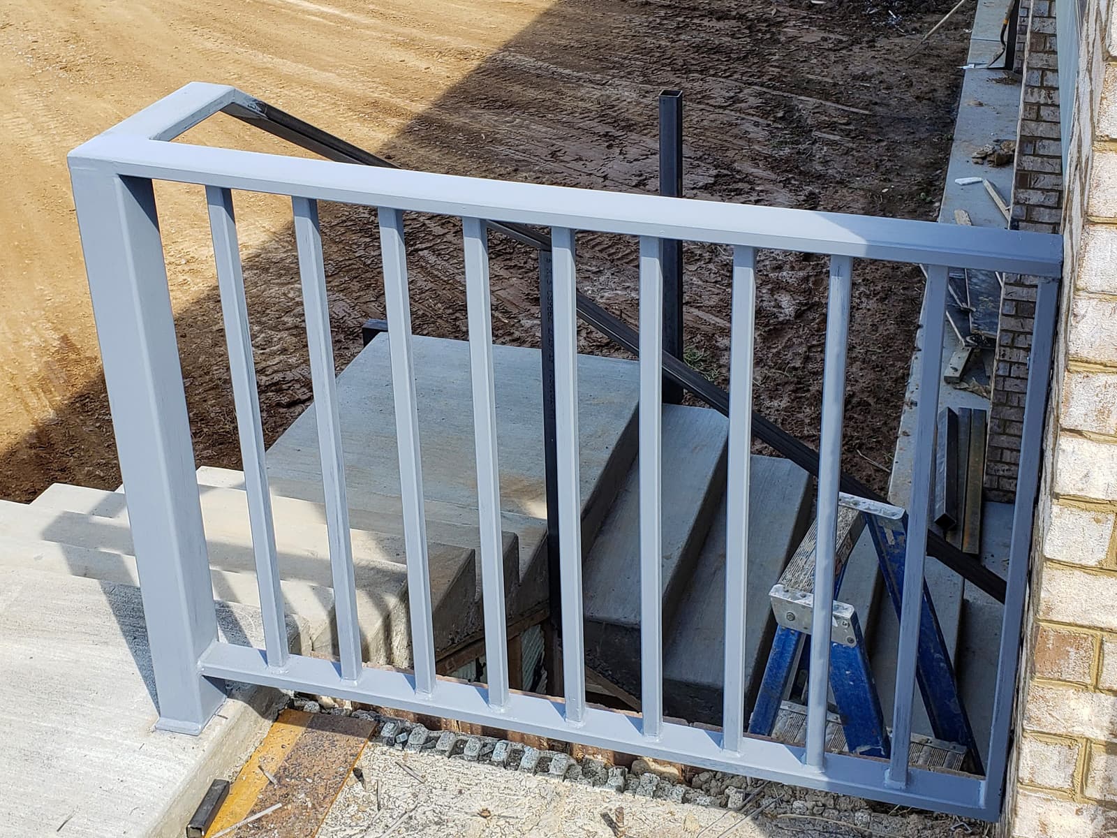 How Sun Exposure Affects Railing Finish Performance Over Time