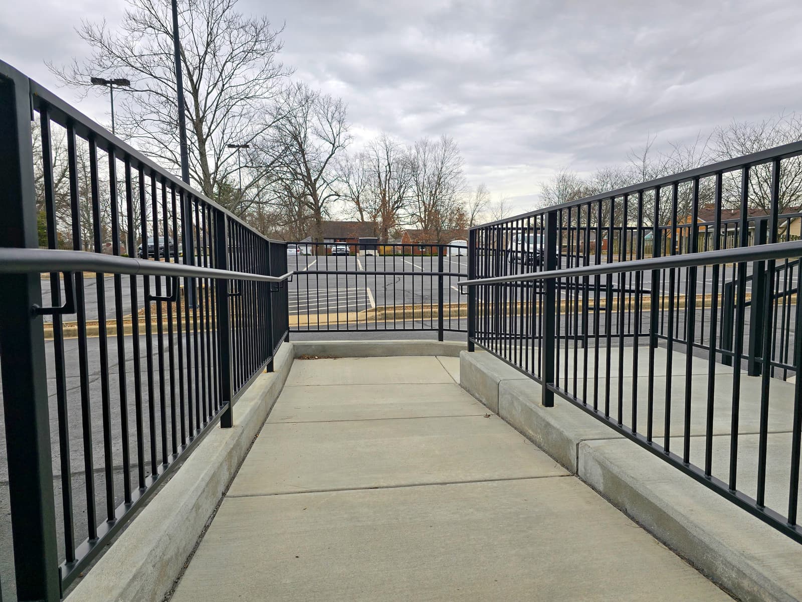 How Sun Exposure Affects Railing Finish Performance Over Time