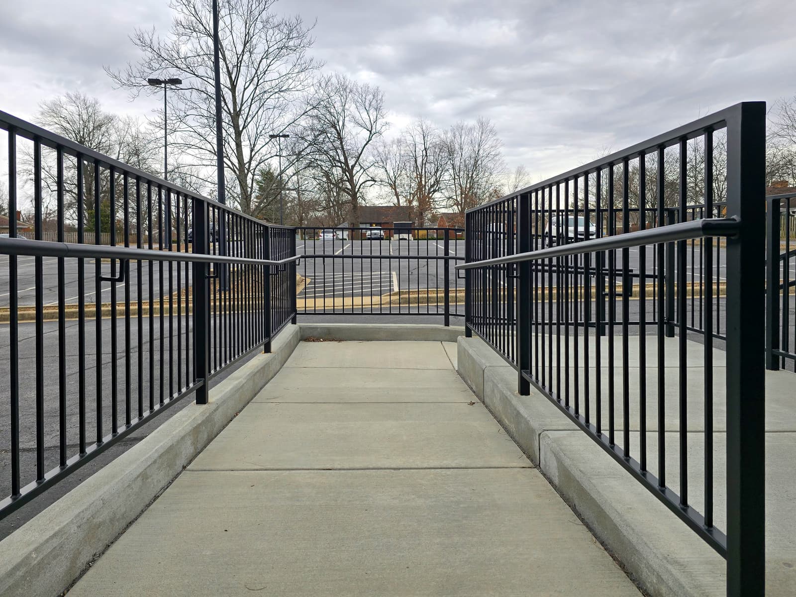 How Sun Exposure Affects Railing Finish Performance Over Time