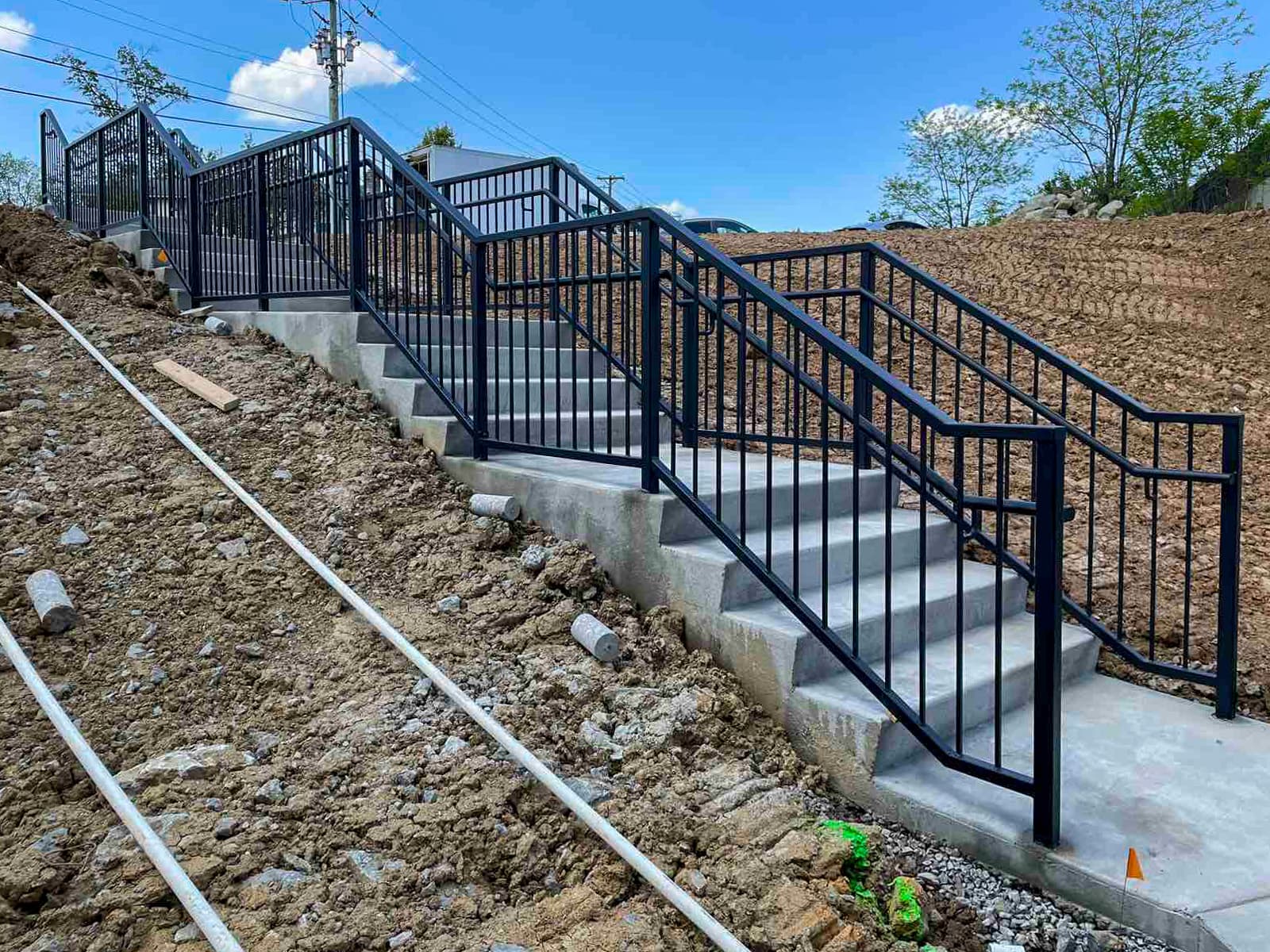 Metal safety railing installed for commercial access protection.