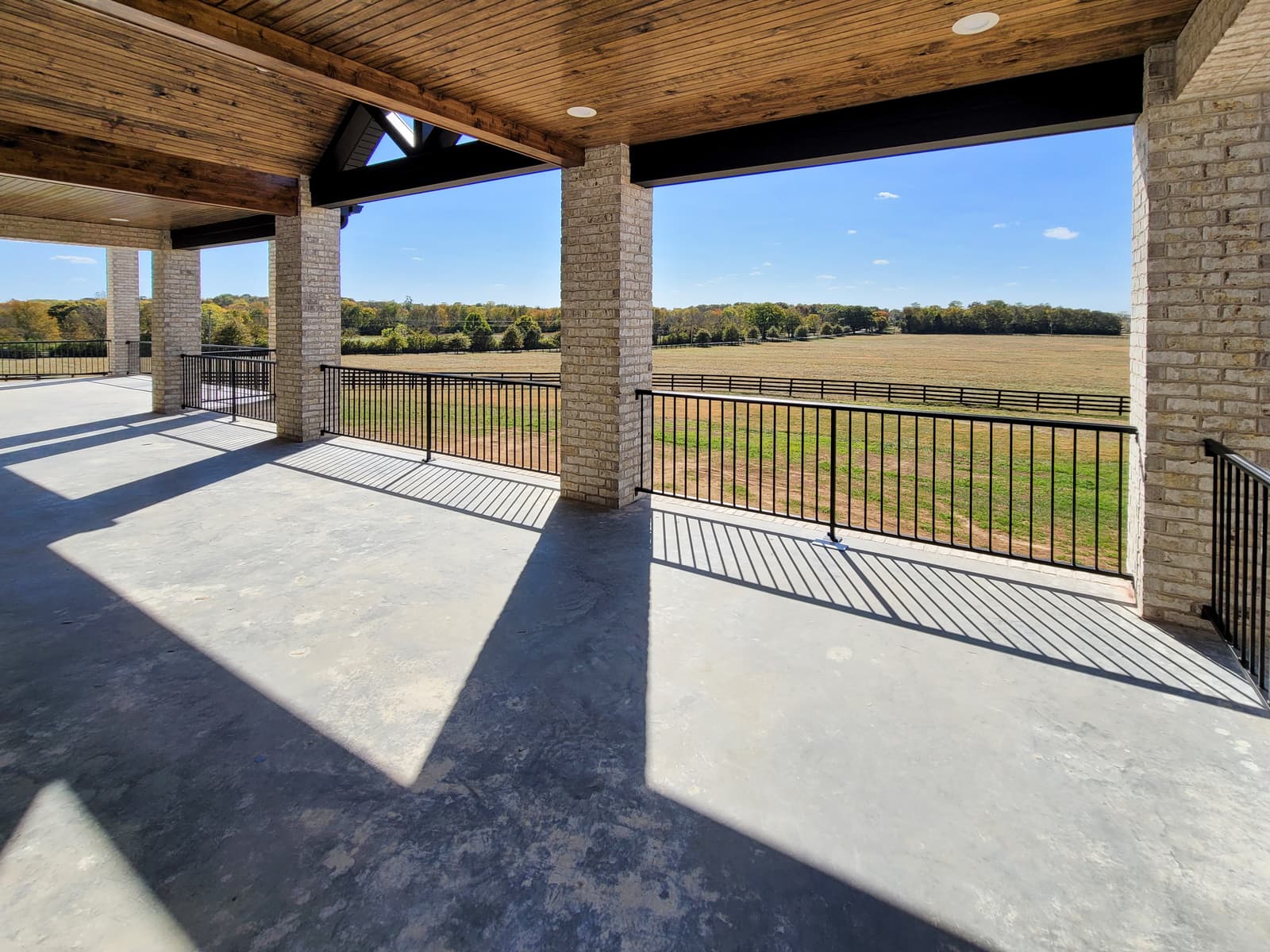 How Sun Exposure Affects Railing Finish Performance Over Time