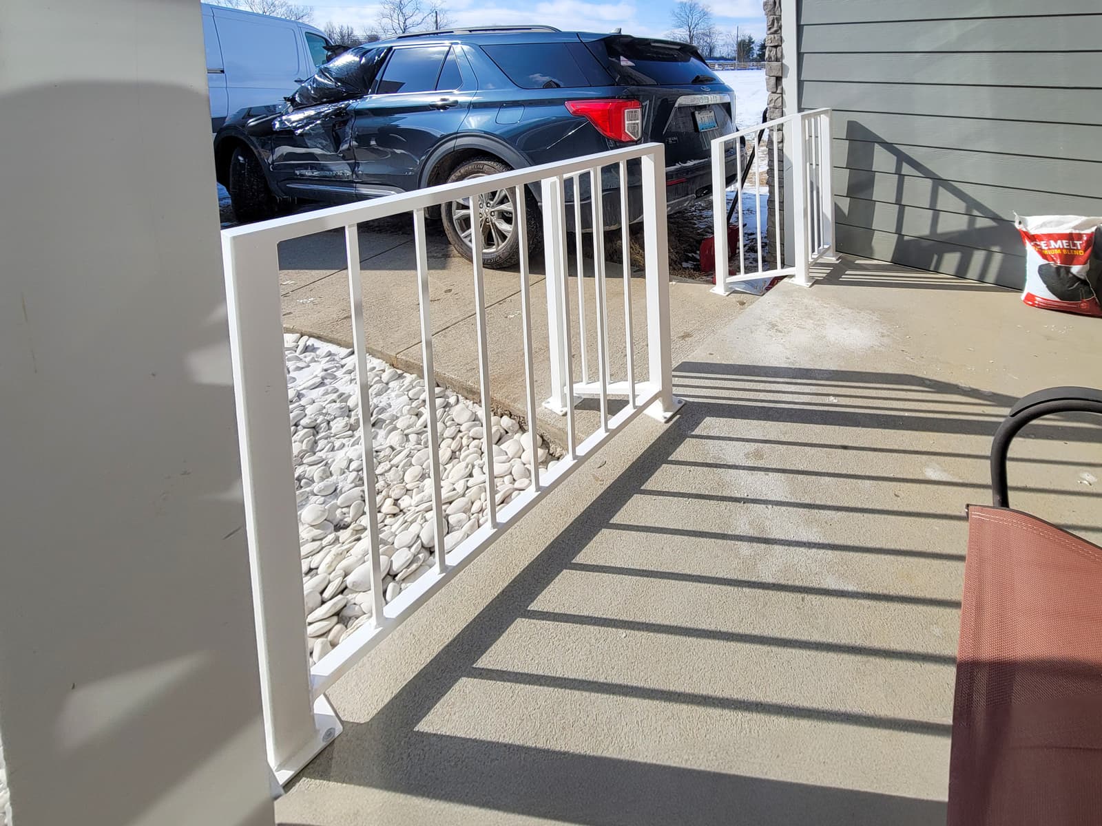 Ornamental porch railing installed at a Central Kentucky entry.