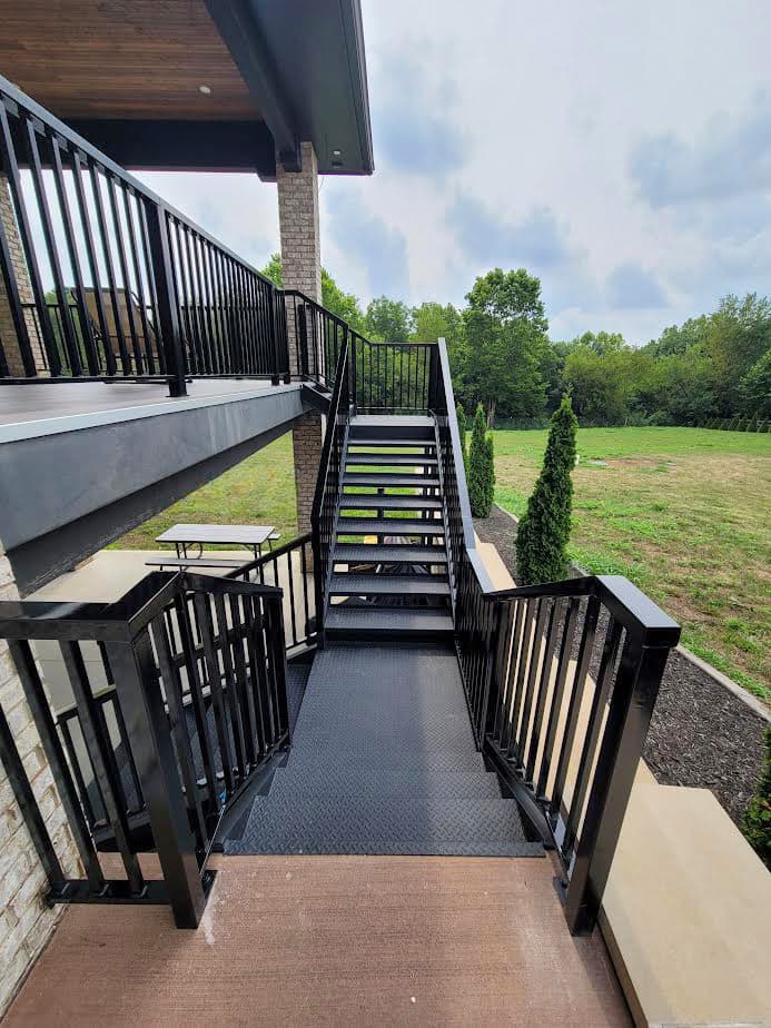 Metal deck railing with stairs and balcony transitions in Lexington, KY.