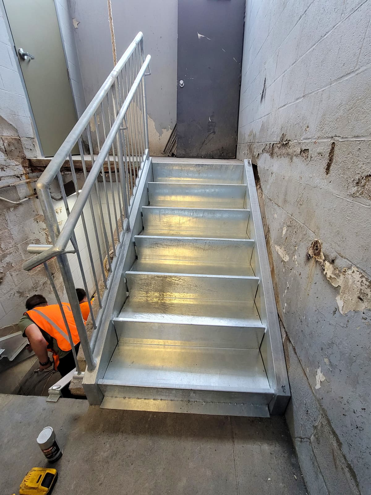 Commercial staircase rebuild showing welded stair frame.